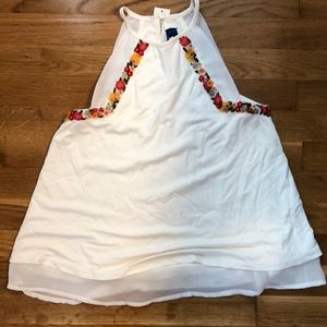 white halter top with floral detailing